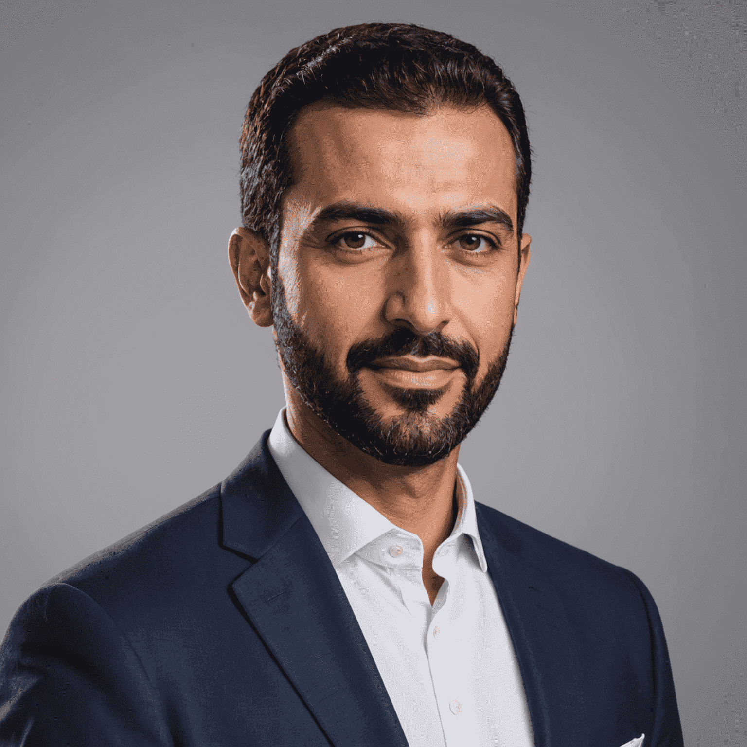 Portrait of Ahmed Al-Mansouri, CEO of TransportService. He is a middle-aged man with short dark hair and a neatly trimmed beard, wearing a crisp white shirt and navy blue blazer. He has a friendly yet professional expression.